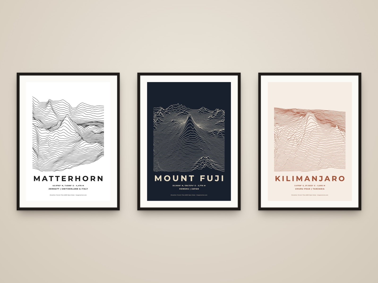 Three framed ridgeline prints: the Matterhorn in black and white, Mount Fuji in night and Kilimanjaro in terracotta