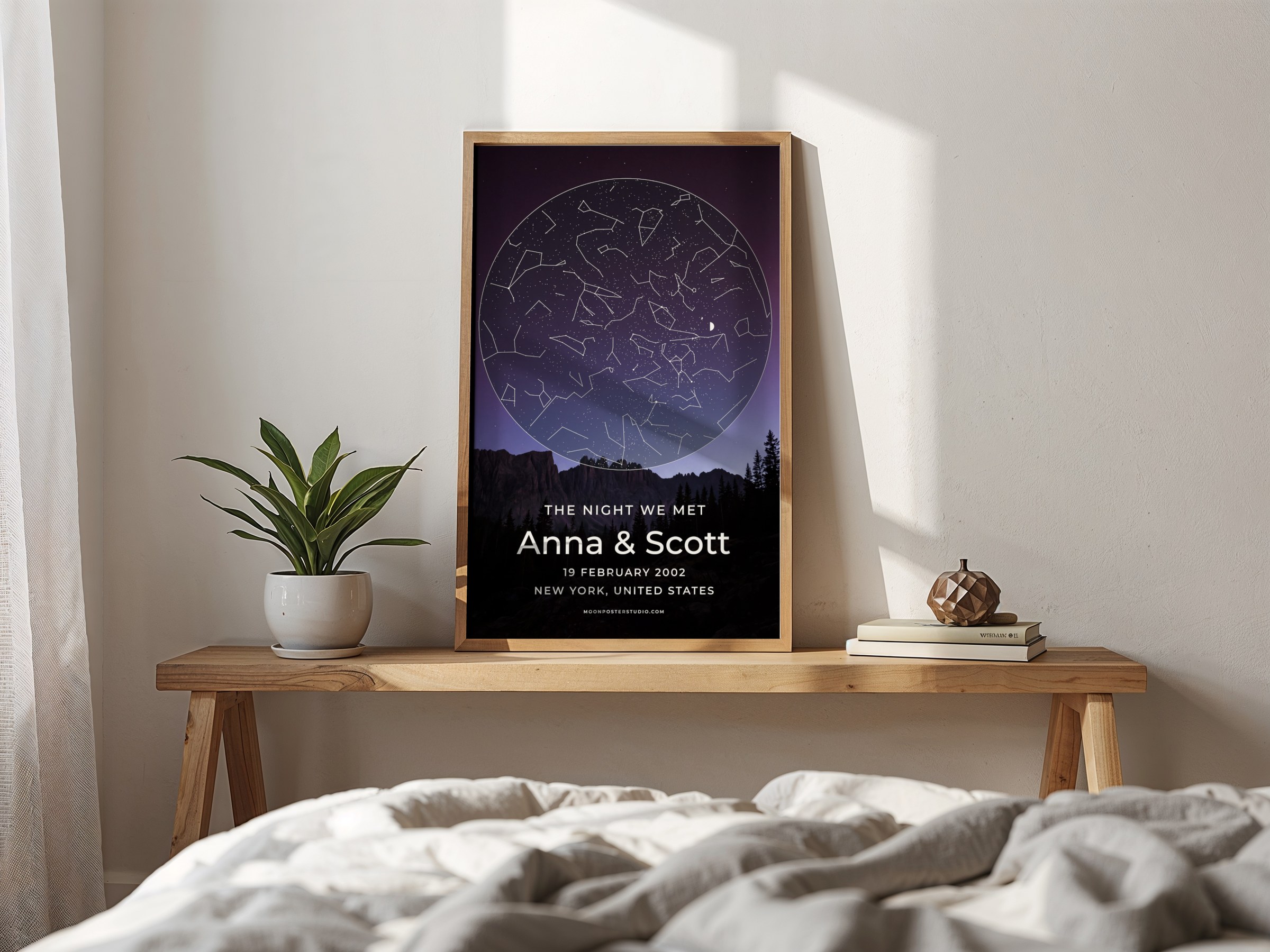 Custom star map 'The night we met' for Anna & Scott, purple night sky, framed on a wooden bench in a bedroom