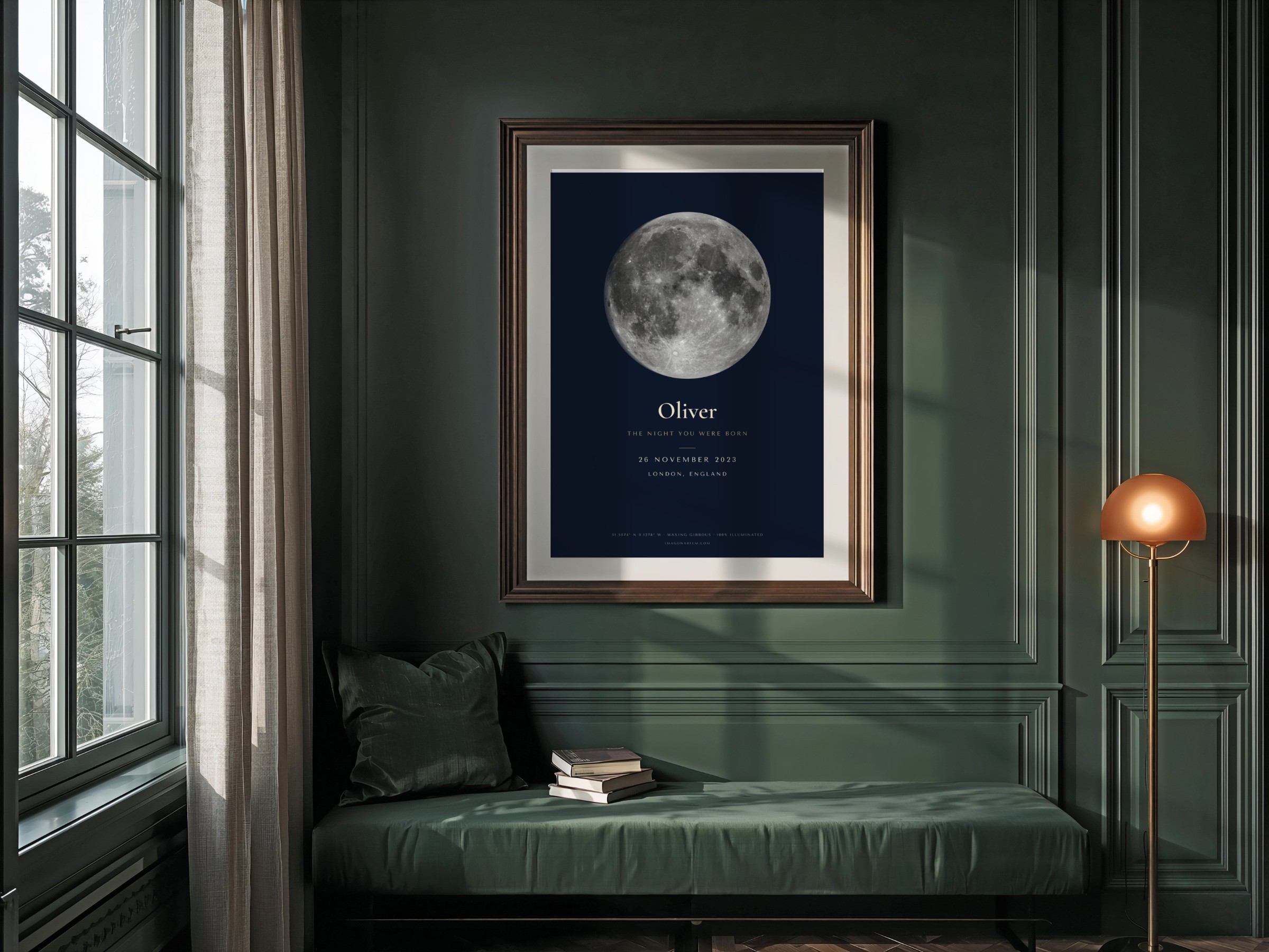 Midnight blue moon print of a full moon, framed in a dark green room
